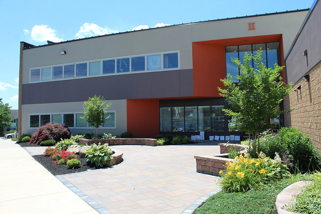 The Front Entrance Of The Larchmont Medical Imaging Mount Laurel Office With Plants