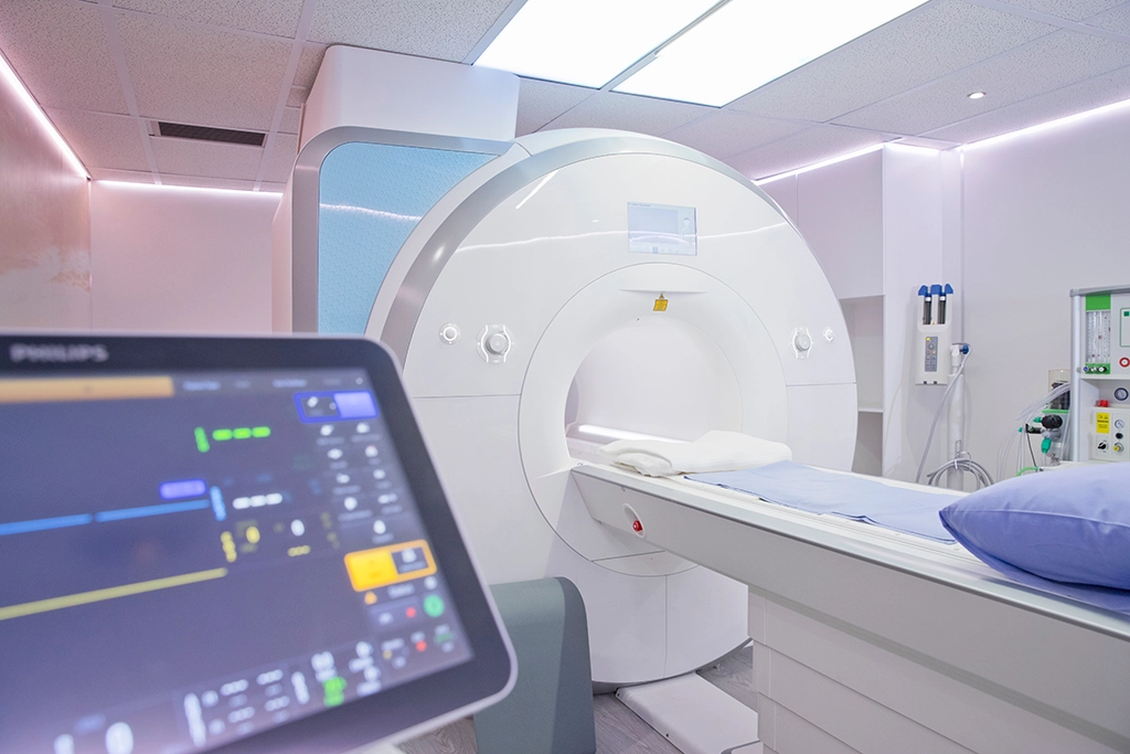 An MRI Machine In Calming Room With Computer Vitals